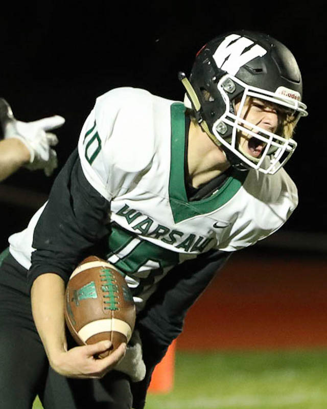 A Warsaw football player celebrates scoring a touchdown in an October 23, 2020, game at Buffalo High School.