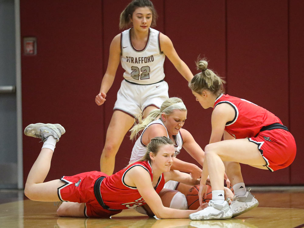 Players from El Dorado Springs and Strafford compete in a high school basketball game on Monday, January 31, 2022, in Strafford, Missouri