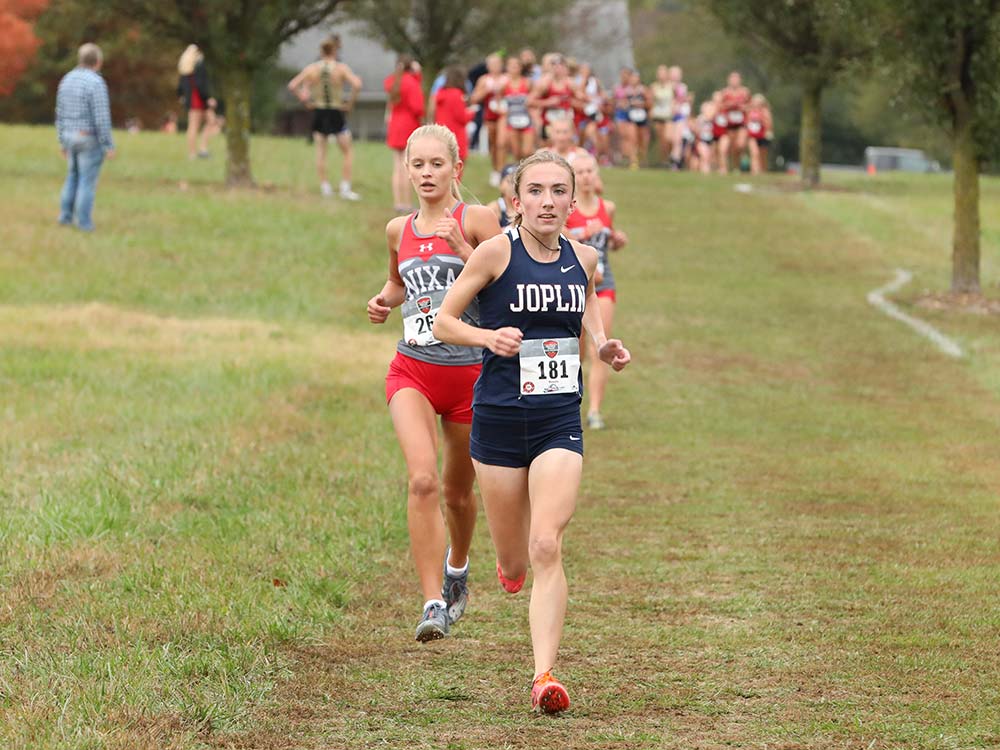 Runners participate in the Central Ozark Conference cross country championships on October 20, 2020, in Nixa, Missouri.